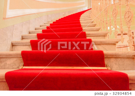 Interior stairs with red carpet 32934854