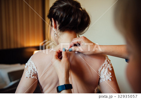 A beautiful woman in a beautiful room in dress
A beautiful woman in a beautiful room in dress
32935057