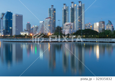 Blurred bokeh light office building with reflect 32935832