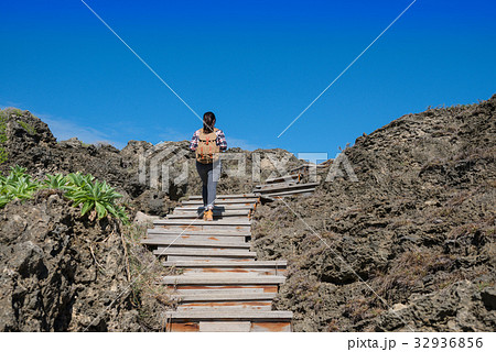clearly blue sky with female backpacker 32936856