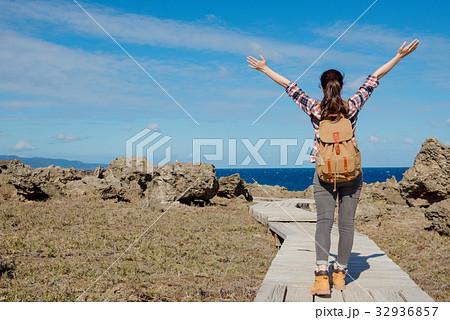 back view photo of beauty pleasantly backpacker 32936857