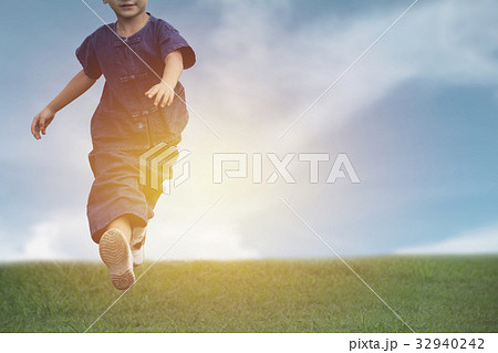 Kid running and playing have fun and joy 32940242