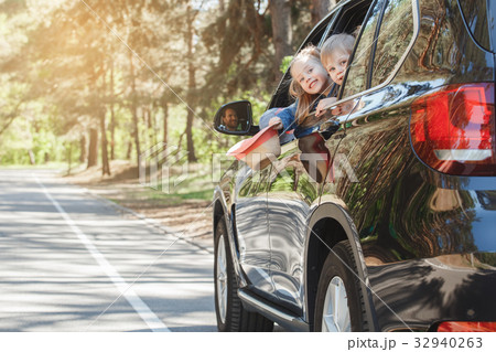 Travel by car family trip together vacation Travel by car family trip together vacation 32940263