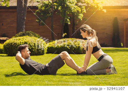 Young couple exercise together outdoors healthy 32941107