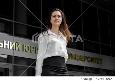 beautiful young girl in white shirt and black 32941692