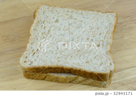 Bread whole wheat on wood background Bread whole wheat on wood background 32943171