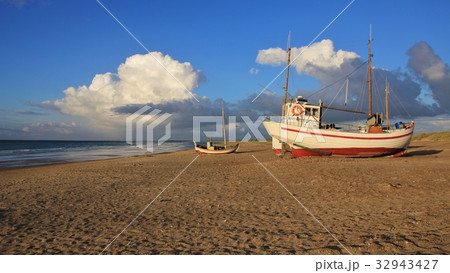 Fishing boat on the shore of the Jammerbugten Fishing boat on the shore of the Jammerbugten 32943427