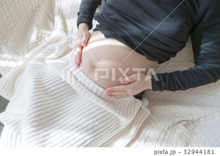 woman during pregnancy or shortly after childbirth woman during pregnancy or shortly after childbirth 32944181
