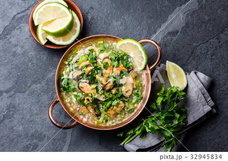 Peruvian food. Mussels ceviche. Cold soup with 32945834