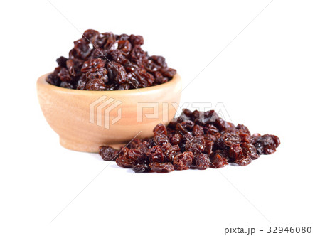 Dried raisins on a white background Dried raisins on a white background 32946080