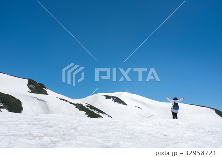 woman on snow mountain 32958721