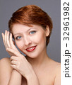 beauty portrait of young woman on gray 32961982