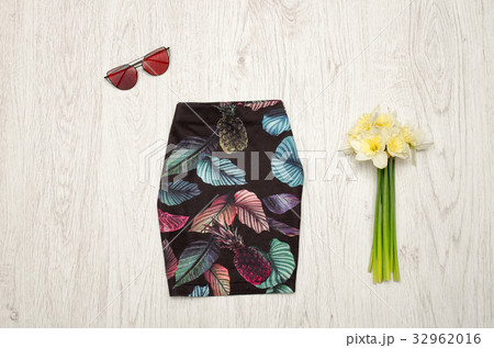 Black skirt with pineapples, glasses, daffodils 32962016