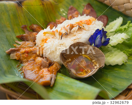 Crab and Barbecued red pork in sauce with rice Crab and Barbecued red pork in sauce with rice 32962679