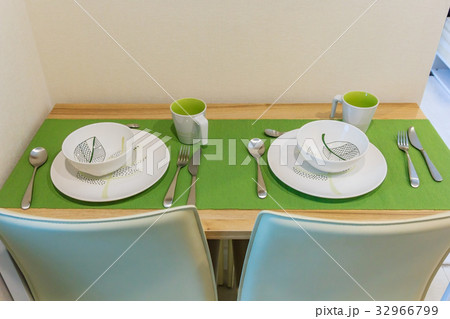wooden table in dining room with elegant table wooden table in dining room with elegant table 32966799