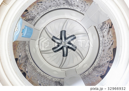 Internal view of an empty washing machine drum 32966932