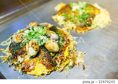 Okonomiyaki Japanese hot plate pizza Okonomiyaki Japanese hot plate pizza 32970245