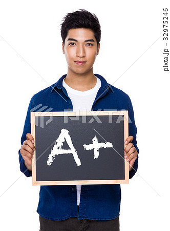 Indian man show with chalkboard showing sign of A plus 32975246