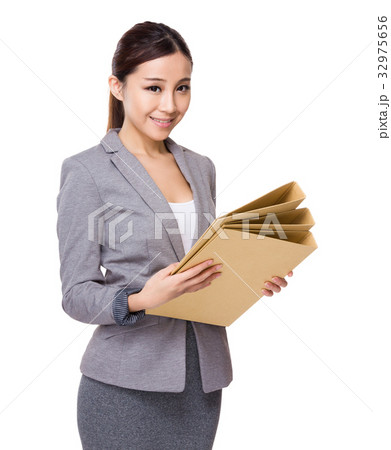 Asian young businesswoman hold with folder Asian young businesswoman hold with folder 32975656