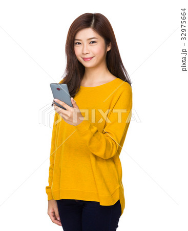 Young woman check email on mobile phone 32975664