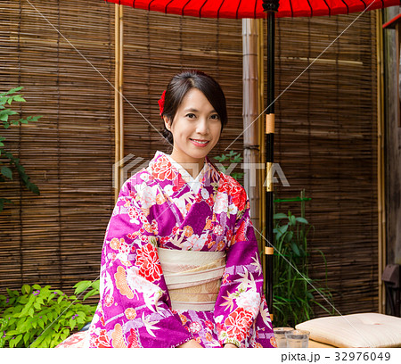Asian Woman with kimono dress at tea house in japan 32976049