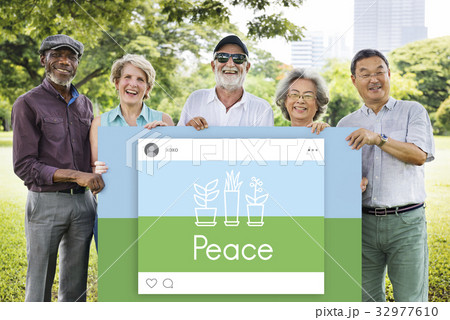 Senior people holding network graphic overlay billboard Senior people holding network graphic overlay billboard 32977610