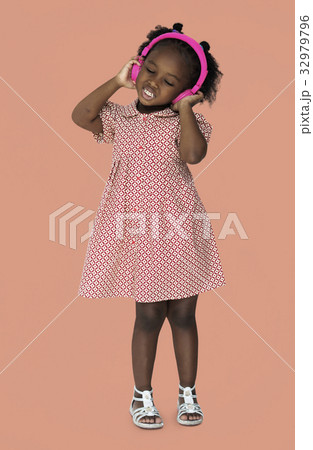 Little Girl Listening Music Headphones Studio Portrait 32979796