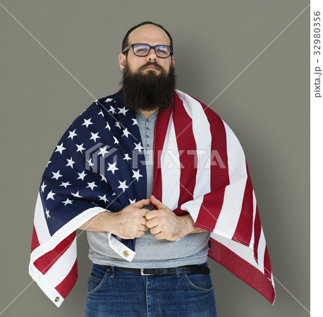 Man holding flag and posing for photoshoot Man holding flag and posing for photoshoot 32980356