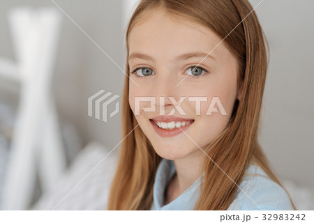 Portrait of beautiful grey eyed girl 32983242
