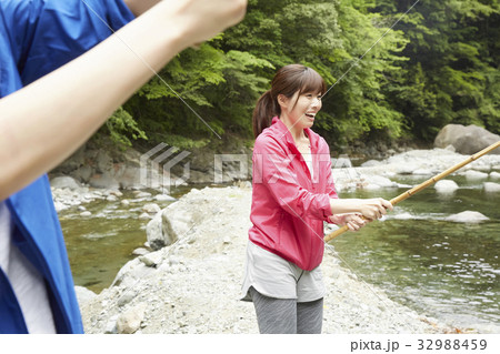 釣りを楽しむ女性の写真素材