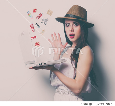portrait of the young woman with shopping bags 32991967
