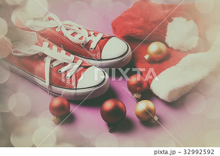 Gumshoes and Santas hat o 32992592
