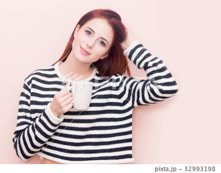 woman with white cup 32993198