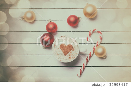 Cup of coffee and christmas candy 32993417