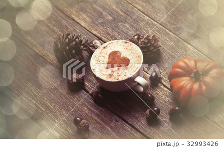 Cup and pine cone with acorn and pumpkin Cup and pine cone with acorn and pumpkin 32993426