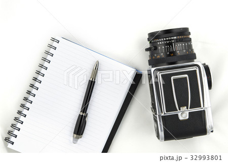 Medium format camera with notebook and pen Medium format camera with notebook and pen 32993801