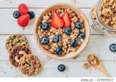 granola with yogurt, fresh berries, strawberry granola with yogurt, fresh berries, strawberry 32994923
