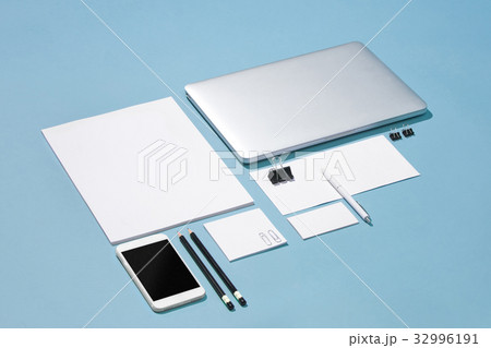 The laptop, pens, phone, note with blank screen on The laptop, pens, phone, note with blank screen on 32996191