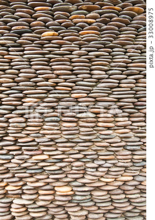 Close up of circle pebble wall,abstract background 33008975