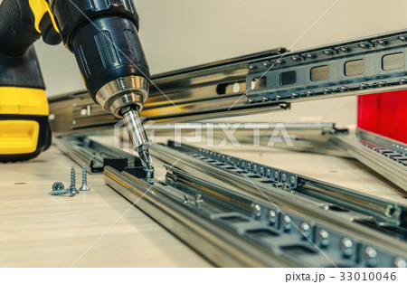 Assembling of furniture closeup 33010046