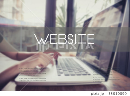 hand typing on keyboard with Website homepage 33010090