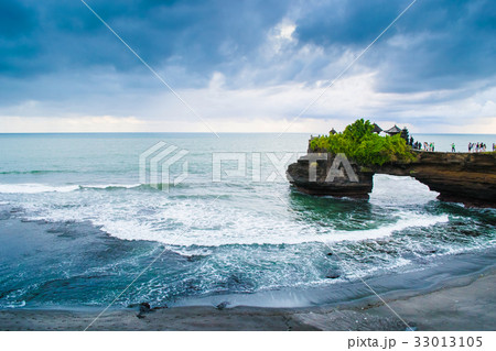 Tanah Lot Temple on the cliff, Uluwatu Bali 33013105