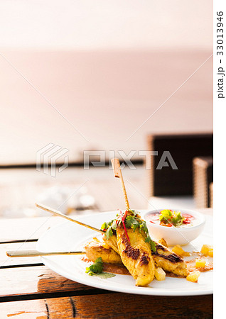 Chicken Satay with peanut sauce Chicken Satay with peanut sauce 33013946