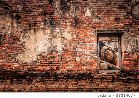 Ruin Buddha sculpture - through the window 33014077