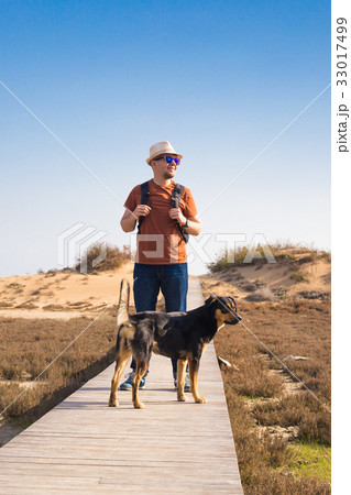 Outdoors lifestyle image of travelling man with Outdoors lifestyle image of travelling man with 33017499