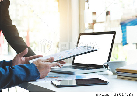 Young business manager working with new startup  33017935