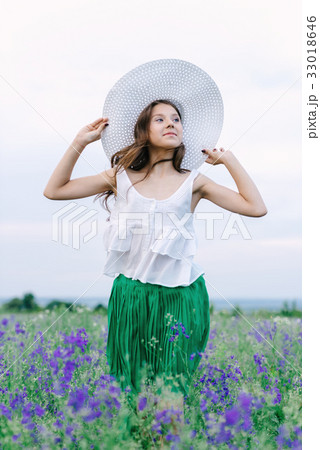 Girl with a bouquet of lavender Girl with a bouquet of lavender 33018646