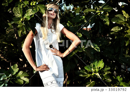 Girl with the exotic plants 33019792