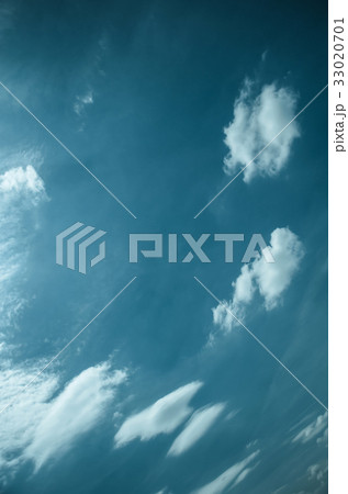 Saturated clouds in the blue sky 33020701