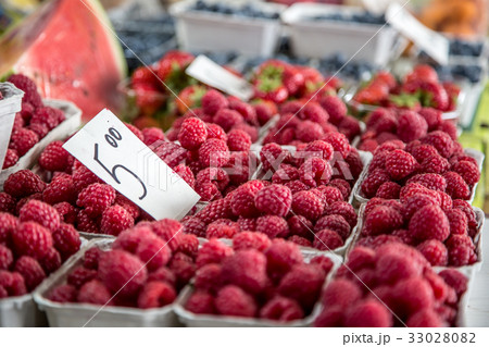 Raspberries on a farm market in the city. Raspberries on a farm market in the city. 33028082